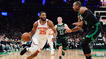 May 14, 2025; Boston, Massachusetts, USA; New York Knicks forward Mikal Bridges (25) controls the ball while Boston Celtics center Al Horford (42) defends in the first half during game five of the second round for the 2025 NBA Playoffs at TD Garden. Mandatory Credit: Bob DeChiara-Imagn Images