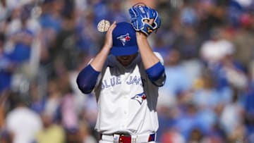 Aug 31, 2025; Toronto, Ontario, CAN; Toronto Blue Jays pitcher Jeff Hoffman (23) holds his head during the ninth inning in their MLB game against the Milwaukee Brewers at Rogers Centre. Mandatory Credit: Kevin Sousa-Imagn Images