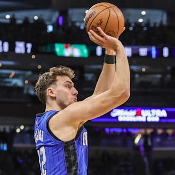 Apr 25, 2025; Orlando, Florida, USA; Orlando Magic forward Franz Wagner (22) shoots a three point basket during the first quarter of game three of first round for the 2024 NBA Playoffs against the Boston Celtics at Kia Center. Mandatory Credit: Mike Watters-Imagn Images