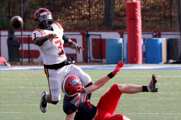 Quarterback Rich Belin from Cardinal Hayes fires a pass against Archbishop Stepinac on Nov. 11, 2023. 