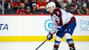 Feb 6, 2025; Calgary, Alberta, CAN; Colorado Avalanche defenseman Cale Makar (8) controls the puck against the Calgary Flames during the third period at Scotiabank Saddledome. Mandatory Credit: Sergei Belski-Imagn Images