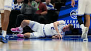 Mar 13, 2025; Charlotte, NC, USA; Duke Blue Devils forward Cooper Flagg (2) is injured in the first half at Spectrum Center. Mandatory Credit: Bob Donnan-Imagn Images
