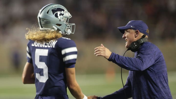 Kansas State freshman quarterback Avery Johnson (5) is applauded by head coach Chris Klienman after scoring a touchdown in the fourth quarter of Saturday's game against Southeast Missouri State inside Bill Snyder Family Stadium.