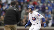 Chicago Cubs left fielder Matt Szczur celebrates with his teammates after hitting in the game winning run against the Philadelphia Phillies at Wrigley Field. 