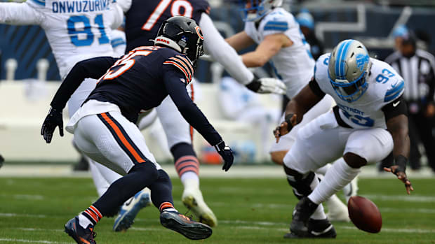 Bears wide receiver Rome Odunze (15) fumbles the ball against the Detroit Lions in 2024