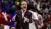 Mar 12, 2025; Nashville, TN, USA;  Arkansas Razorbacks head coach John Calipari screams instructions to his team against the South Carolina Gamecocks during the second half at Bridgestone Arena. Mandatory Credit: Steve Roberts-Imagn Images