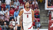 Feb 25, 2025; Tuscaloosa, Alabama, USA; Alabama Crimson Tide guard Chris Youngblood (8) celebrates after a three point basket against the Mississippi State Bulldogs during the first half at Coleman Coliseum. Mandatory Credit: Will McLelland-Imagn Images