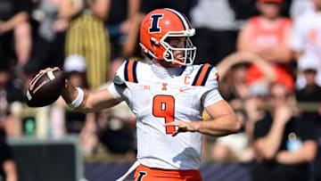 Oct 4, 2025; West Lafayette, Indiana, USA; Illinois Fighting Illini quarterback Luke Altmyer (9) looks to throw a pass against the Purdue Boilermakers during the second half at Ross-Ade Stadium. Mandatory Credit: Marc Lebryk-Imagn Images