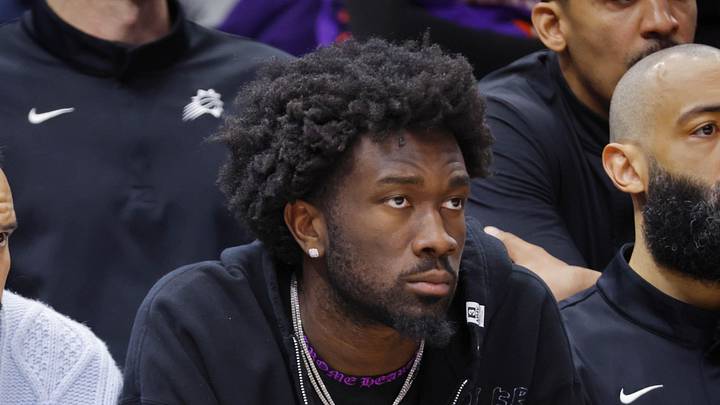 Mar 17, 2026; Minneapolis, Minnesota, USA; Phoenix Suns guard Jalen Green (4) and center Mark Williams (15) watch as their team plays the Minnesota Timberwolves in the fourth quarter at Target Center. Mandatory Credit: Bruce Kluckhohn-Imagn Images