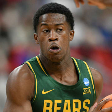 Mar 21, 2025; Raleigh, NC, USA; Baylor Bears guard VJ Edgecombe (7) has the ball against the Mississippi State Bulldogs during the second half in the first round of the NCAA Tournament at Lenovo Center. Mandatory Credit: Zachary Taft-Imagn Images