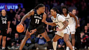 Mar 12, 2025; New York, NY, USA; Butler Bulldogs forward Jahmyl Telfort (11) controls the ball against Providence Friars guard Corey Floyd Jr. (14) during the second half at Madison Square Garden. Mandatory Credit: Brad Penner-Imagn Images