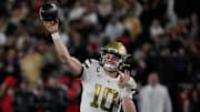 Georgia Tech quarterback Haynes King (10) throws a pass during the first half of a NCAA college football game against Georgia Tech in Athens, Ga., on Friday, Nov. 29, 2024.