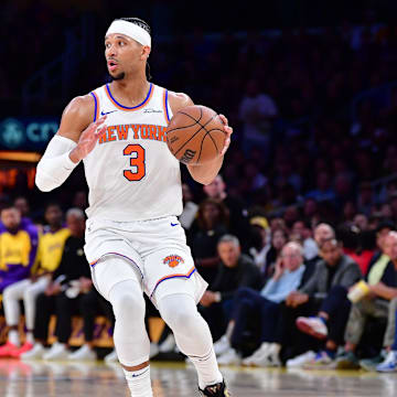 Mar 6, 2025; Los Angeles, California, USA; New York Knicks guard Josh Hart (3) controls the ball against the Los Angeles Lakers during the first half at Crypto.com Arena. Mandatory Credit: Gary A. Vasquez-Imagn Images