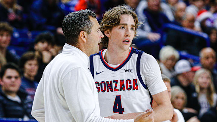 Gonzaga assistant coach Brian Michaelson and sophomore guard Dusty Stromer. Gonzaga assistant coach Brian Michaelson and sophomore guard Dusty Stromer.