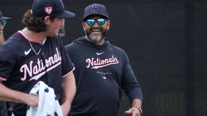 Feb 16, 2024; West Palm Beach, FL, USA; Washington Nationals manager Dave Martinez, right, has a laugh following workouts at spring training. Mandatory Credit: Jim Rassol-USA TODAY SportsMandatory Credit: Jim Rassol-USA TODAY Sports