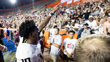 Sep 14, 2024; Gainesville, Florida, USA; Texas A&M Aggies quarterback Marcel Reed (10) celebrates after defeating the Florida Gators at Ben Hill Griffin Stadium. Mandatory Credit: Matt Pendleton-Imagn Images