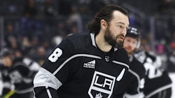 Apr 6, 2024; Los Angeles, California, USA; Los Angeles Kings defenseman Drew Doughty (8) looks on before a game against the Vancouver Canucks at Crypto.com Arena. Mandatory Credit: Jessica Alcheh-Imagn Images
