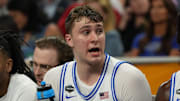 Apr 5, 2025; San Antonio, TX, USA; Duke Blue Devils forward Cooper Flagg (2) looks on from the bench against the Houston Cougars during the second half in the semifinals of the men's Final Four of the 2025 NCAA Tournament at the Alamodome. Mandatory Credit: Bob Donnan-Imagn Images