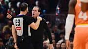 Dec 5, 2025; Cleveland, Ohio, USA; Cleveland Cavaliers head coach Kenny Atkinson argues a call with referee Mark Lindsay (29) during the first half against the San Antonio Spurs at Rocket Arena. Mandatory Credit: Ken Blaze-Imagn Images