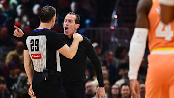 Dec 5, 2025; Cleveland, Ohio, USA; Cleveland Cavaliers head coach Kenny Atkinson argues a call with referee Mark Lindsay (29) during the first half against the San Antonio Spurs at Rocket Arena. Mandatory Credit: Ken Blaze-Imagn Images