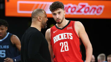 Feb 14, 2024; Memphis, Tennessee, USA; Houston Rockets head coach Ime Udoka (left) talks with center Alperen Sengun (28) during the first half against the Memphis Grizzlies at FedExForum. Mandatory Credit: Petre Thomas-USA TODAY Sports