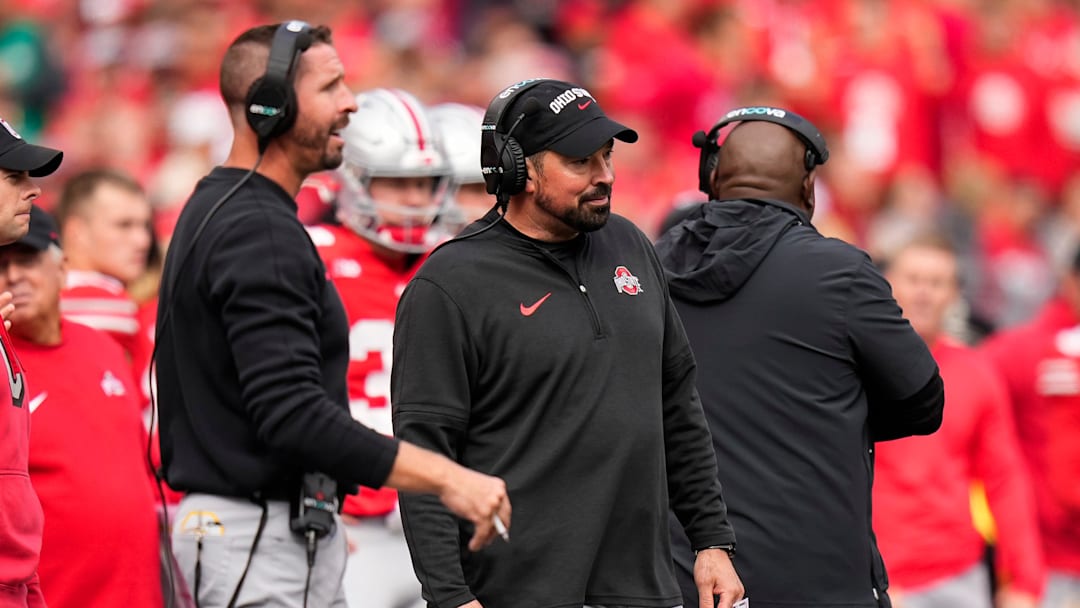 Oct 21, 2023; Columbus, Ohio, USA; Ohio State Buckeyes head coach Ryan Day watches beside offensive coordinator Brian Hartline during the NCAA football game against the Penn State Nittany Lions at Ohio Stadium. Oct 21, 2023; Columbus, Ohio, USA; Ohio State Buckeyes head coach Ryan Day watches beside offensive coordinator Brian Hartline during the NCAA football game against the Penn State Nittany Lions at Ohio Stadium.