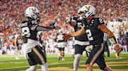 Vanderbilt running back Sedrick Alexander (28) and quarterback Diego Pavia (2) celebrate a touchdown during the third quarter against Auburn at FirstBank Stadium in Nashville, Tenn., Saturday, Nov. 8, 2025.