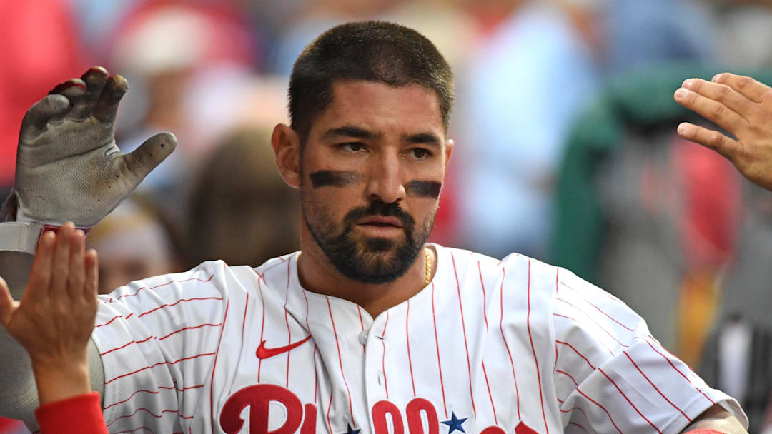 Aug 18, 2025; Philadelphia, Pennsylvania, USA; Philadelphia Phillies outfielder Nick Castellanos (8) celebrates in the dugout after scoring a run during the second inning against the Seattle Mariners at Citizens Bank Park. Mandatory Credit: Eric Hartline-Imagn Images