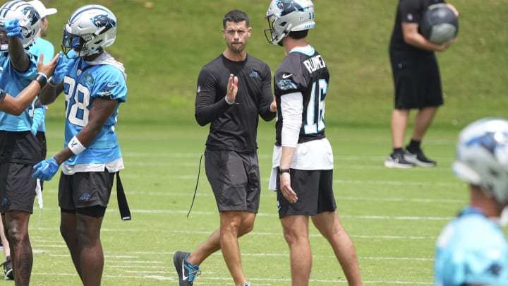 Jun 4, 2024; Charlotte, NC, USA; Carolina Panthers Head Coach Dave Canales claps watching offensive drills during OTAs. Mandatory Credit: Jim Dedmon-USA TODAY Sports