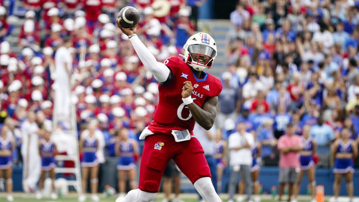 Sep 23, 2023; Lawrence, Kansas, USA; Kansas Jayhawks quarterback Jalon Daniels (6) throws a pass during the first half against the Brigham Young Cougars at David Booth Kansas Memorial Stadium. 