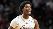 Feb 11, 2025; College Station, Texas, USA; Texas A&M Aggies forward Solomon Washington (9) reacts during the second half against the Georgia Bulldogs at Reed Arena. Mandatory Credit: Maria Lysaker-Imagn Images 