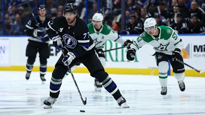 Nov 23, 2024; Tampa, Florida, USA; Tampa Bay Lightning defenseman Victor Hedman (77) controls the puck against the Dallas Stars in the first period at Amalie Arena. Mandatory Credit: Nathan Ray Seebeck-Imagn Images