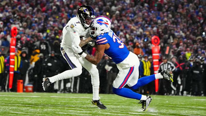 Jan 19, 2025; Orchard Park, New York, USA; Baltimore Ravens wide receiver Rashod Bateman (7) makes a catch against Buffalo Bills cornerback Rasul Douglas (31) during the second quarter in a 2025 AFC divisional round game at Highmark Stadium. Jan 19, 2025; Orchard Park, New York, USA; Baltimore Ravens wide receiver Rashod Bateman (7) makes a catch against Buffalo Bills cornerback Rasul Douglas (31) during the second quarter in a 2025 AFC divisional round game at Highmark Stadium.
