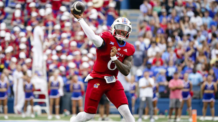 Sep 23, 2023; Lawrence, Kansas, USA; Kansas Jayhawks quarterback Jalon Daniels (6) throws a pass during the first half against the Brigham Young Cougars at David Booth Kansas Memorial Stadium. Mandatory Credit: Jay Biggerstaff-USA TODAY Sports