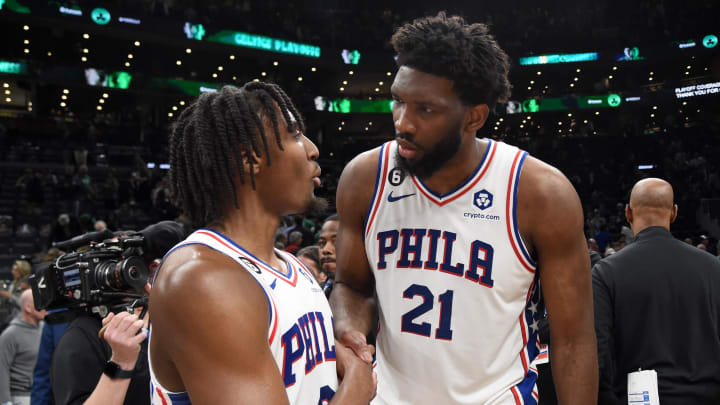 Philadelphia 76ers guard Tyrese Maxey (0) and center Joel Embiid (21) shake hands after defeating the Boston Celtics in game five of the 2023 NBA playoffs at TD Garden. Mandatory Credit: