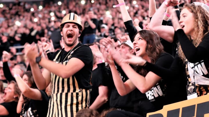 Purdue's Paint Crew cheers as the Boilermaker starters are announced before a game against Indiana.