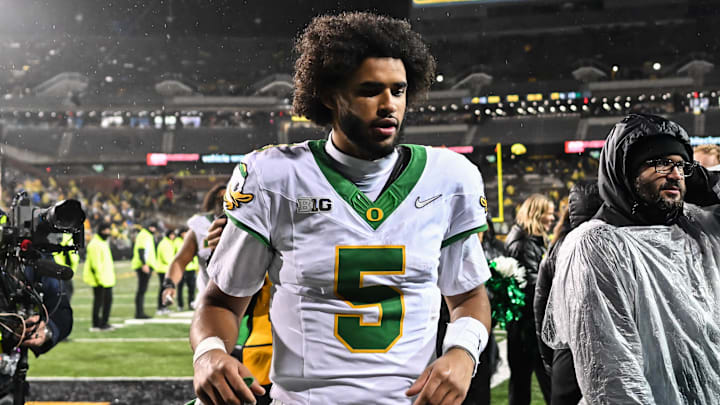 Dante Moore and Oregon are favored against Minnesota on Friday.