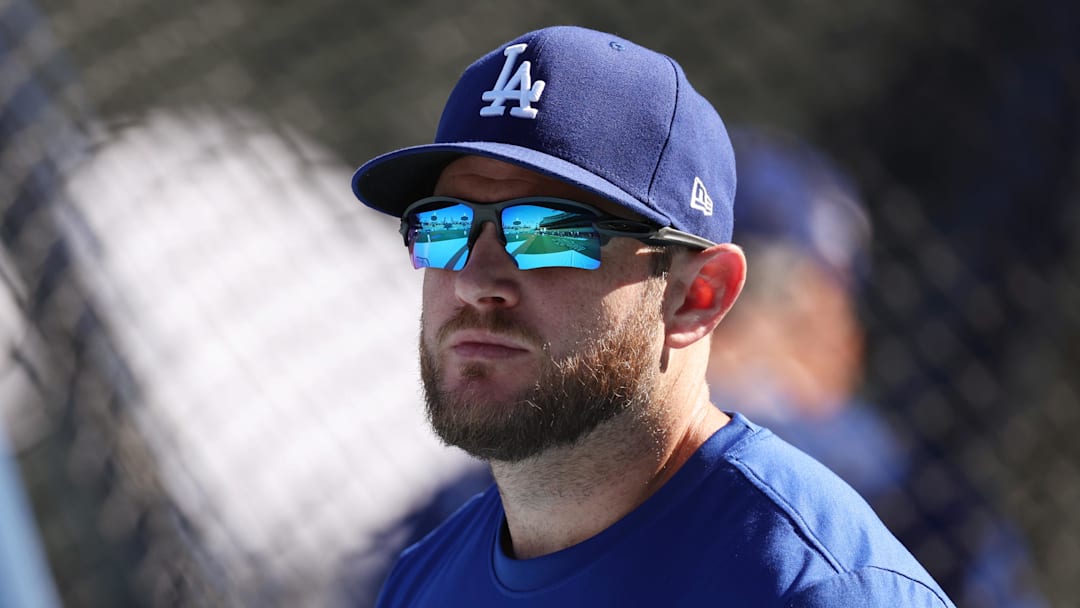 Oct 29, 2025; Los Angeles, California, USA; Los Angeles Dodgers third baseman Max Muncy (13) looks on during batting practice before game five of the 2025 MLB World Series against the Toronto Blue Jays at Dodger Stadium. Mandatory Credit: Kiyoshi Mio-Imagn Images
