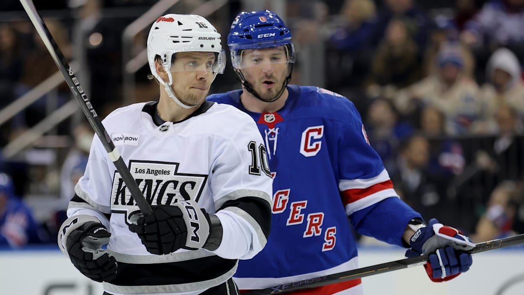 Mar 16, 2026; New York, New York, USA; New York Rangers left wing J.T. Miller (8) talks to Los Angeles Kings left wing Artemi Panarin (10) as he skates by during the third period at Madison Square Garden. Mandatory Credit: Brad Penner-Imagn Images