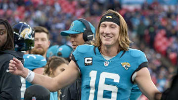Oct 20, 2024; London, United Kingdom; Jacksonville Jaguars quarterback Trevor Lawrence (16) smiles with teammates in the second half during an NFL International Series game at Wembley Stadium. 