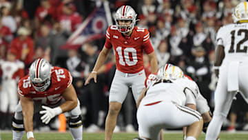 Sep 7, 2024; Columbus, Ohio, USA;  Ohio State Buckeyes quarterback Julian Sayin (10) takes a snap against the Western Michigan Broncos during the second half at Ohio Stadium.  Mandatory Credit: Adam Cairns-Imagn Images