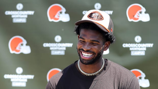 Cleveland Browns quarterback Shedeur Sanders (12) jokes about his signing bonus during a press conference before day two of N Cleveland Browns quarterback Shedeur Sanders (12) jokes about his signing bonus during a press conference before day two of N