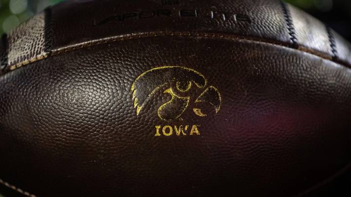 Oct 1, 2021; College Park, Maryland, USA; A detailed view of an Iowa Hawkeyes logo on a football during the second half of the game between the Maryland Terrapins and the Iowa Hawkeyes at Capital One Field at Maryland Stadium. Mandatory Credit: Scott Taetsch-Imagn Images