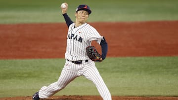 Aug 4, 2021; Yokohama, Japan; Team Japan pitcher Yoshinobu Yamamoto (17) throws a pitch against
