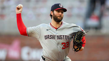 May 30, 2024; Atlanta, Georgia, USA; Washington Nationals starting pitcher Trevor Williams (32) throws against the Atlanta Braves in the third inning at Truist Park. 