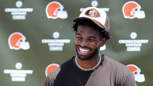 Cleveland Browns quarterback Shedeur Sanders (12) jokes about his signing bonus during a press conference before day two of N Cleveland Browns quarterback Shedeur Sanders (12) jokes about his signing bonus during a press conference before day two of N