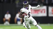 Sep 13, 2021; Paradise, Nevada, USA; Baltimore Ravens wide receiver Marquise Brown (5) runs the ball against the Las Vegas Raiders during the first half at Allegiant Stadium. Mandatory Credit: Mark J. Rebilas-USA TODAY Sports