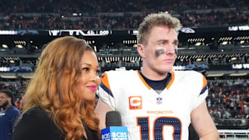 Dec 7, 2025; Paradise, Nevada, USA; Denver Broncos quarterback Bo Nix (10) with CBS sideline reporter AJ Ross following a game against the Las Vegas Raiders at Allegiant Stadium. 