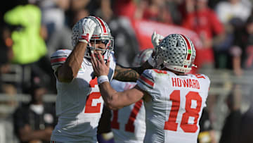 Jan 1, 2025; Pasadena, CA, USA; Ohio State Buckeyes wide receiver Emeka Egbuka (2) celebrates with quarterback Will Howard (18) after scoring a touchdown against the Oregon Ducks in the first quarter during the 2025 Rose Bowl college football quarterfinal game at Rose Bowl Stadium. Mandatory Credit: Jayne Kamin-Oncea-Imagn Images