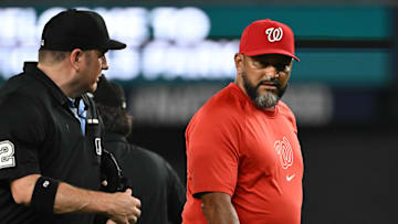 Aug 26, 2024; Washington, District of Columbia, USA; Washington Nationals manager Dave Martinez (4) talks with umpire Dan Bellino against the New York Yankees during the eighth inning at Nationals Park.